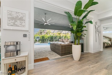 Step into elevated Southwest Cape Coral living where thoughtful on Royal Tee Country Club in Florida - for sale on GolfHomes.com, golf home, golf lot