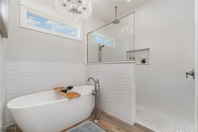 Step into elevated Southwest Cape Coral living where thoughtful on Royal Tee Country Club in Florida - for sale on GolfHomes.com, golf home, golf lot