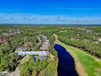 Discover a rare opportunity to own one of the few remaining pond on Members Club At St. James Plantation in North Carolina - for sale on GolfHomes.com, golf home, golf lot