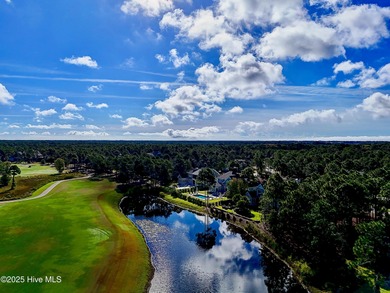 Discover a rare opportunity to own one of the few remaining pond on Members Club At St. James Plantation in North Carolina - for sale on GolfHomes.com, golf home, golf lot