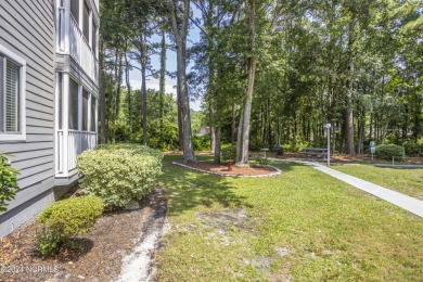 Welcome to this charming first-floor condo, ideally positioned on Carolina Shores Golf Course in North Carolina - for sale on GolfHomes.com, golf home, golf lot