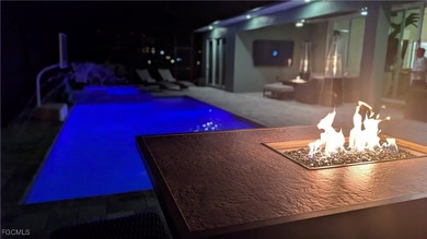 Step into elevated Southwest Cape Coral living where thoughtful on Royal Tee Country Club in Florida - for sale on GolfHomes.com, golf home, golf lot