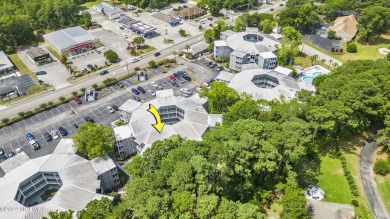 Welcome to this charming first-floor condo, ideally positioned on Carolina Shores Golf Course in North Carolina - for sale on GolfHomes.com, golf home, golf lot