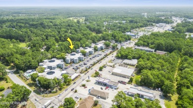 Welcome to this charming first-floor condo, ideally positioned on Carolina Shores Golf Course in North Carolina - for sale on GolfHomes.com, golf home, golf lot