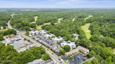 Welcome to this charming first-floor condo, ideally positioned on Carolina Shores Golf Course in North Carolina - for sale on GolfHomes.com, golf home, golf lot