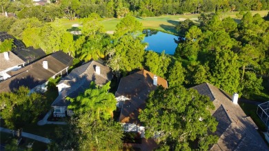 Under contract-accepting backup offers. SPECTACULAR SETTING on Westchase Golf Club in Florida - for sale on GolfHomes.com, golf home, golf lot