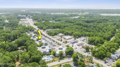 Welcome to this charming first-floor condo, ideally positioned on Carolina Shores Golf Course in North Carolina - for sale on GolfHomes.com, golf home, golf lot