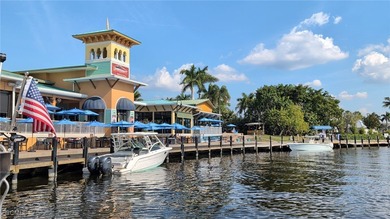 Step into elevated Southwest Cape Coral living where thoughtful on Royal Tee Country Club in Florida - for sale on GolfHomes.com, golf home, golf lot