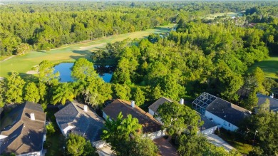 Under contract-accepting backup offers. SPECTACULAR SETTING on Westchase Golf Club in Florida - for sale on GolfHomes.com, golf home, golf lot