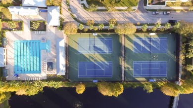 Under contract-accepting backup offers. SPECTACULAR SETTING on Westchase Golf Club in Florida - for sale on GolfHomes.com, golf home, golf lot