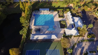 Under contract-accepting backup offers. SPECTACULAR SETTING on Westchase Golf Club in Florida - for sale on GolfHomes.com, golf home, golf lot