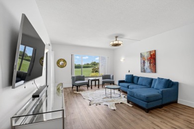 Delray's best kept secret! This beautiful and spacious condo is on Hamlet Country Club in Florida - for sale on GolfHomes.com, golf home, golf lot