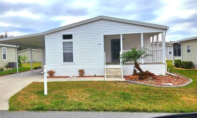 Located in a 55+ resort-style manufactured home community on on Big Cypress Golf and Country Club in Florida - for sale on GolfHomes.com, golf home, golf lot