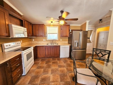 Located in a 55+ resort-style manufactured home community on on Big Cypress Golf and Country Club in Florida - for sale on GolfHomes.com, golf home, golf lot
