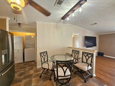 Located in a 55+ resort-style manufactured home community on on Big Cypress Golf and Country Club in Florida - for sale on GolfHomes.com, golf home, golf lot