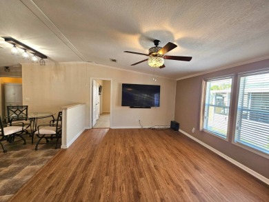 Located in a 55+ resort-style manufactured home community on on Big Cypress Golf and Country Club in Florida - for sale on GolfHomes.com, golf home, golf lot
