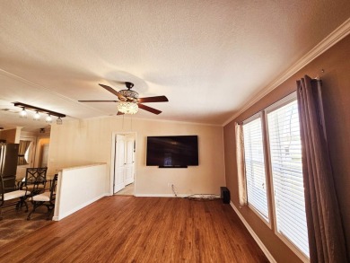Located in a 55+ resort-style manufactured home community on on Big Cypress Golf and Country Club in Florida - for sale on GolfHomes.com, golf home, golf lot