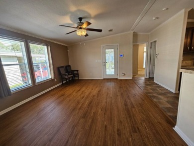 Located in a 55+ resort-style manufactured home community on on Big Cypress Golf and Country Club in Florida - for sale on GolfHomes.com, golf home, golf lot