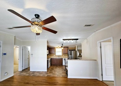 Located in a 55+ resort-style manufactured home community on on Big Cypress Golf and Country Club in Florida - for sale on GolfHomes.com, golf home, golf lot