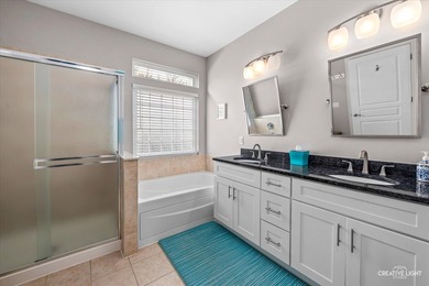 Beautifully maintained, move-in ready home featuring neutral on Carillon Lakes 3 Hole Course in Illinois - for sale on GolfHomes.com, golf home, golf lot