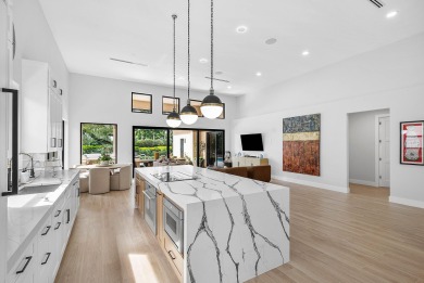 This stunning Restoration Hardware decorated home is located in on Broken Sound Golf and Club  in Florida - for sale on GolfHomes.com, golf home, golf lot