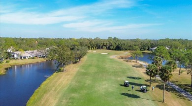 Easy living with fabulous pond and golf views in The Meadows on The Meadows Golf and Country Club in Florida - for sale on GolfHomes.com, golf home, golf lot