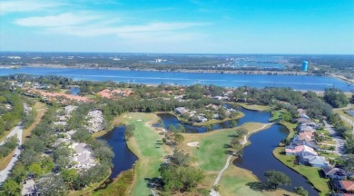 Easy living with fabulous pond and golf views in The Meadows on The Meadows Golf and Country Club in Florida - for sale on GolfHomes.com, golf home, golf lot