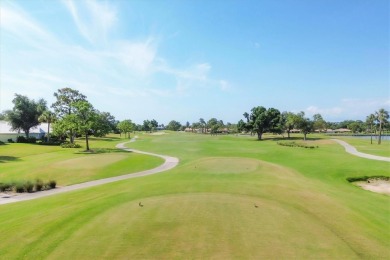 Wake up to sunrise across the verdant fairway from the 2 on Plantation Golf and Country Club in Florida - for sale on GolfHomes.com, golf home, golf lot