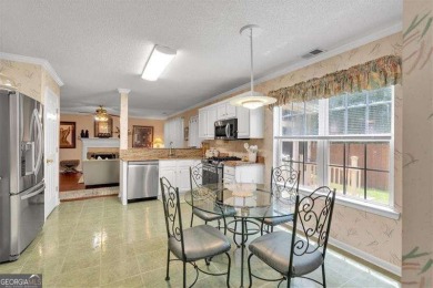 Welcome to 3573 WILLOW TREE TRACE, a beautifully maintained on Sugar Creek Golf Course in Georgia - for sale on GolfHomes.com, golf home, golf lot