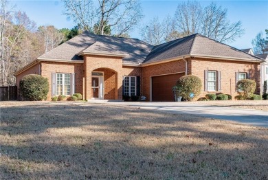 Welcome to this charming home in the desirable Lake Down North on Canongate At Georgia National Golf Club in Georgia - for sale on GolfHomes.com, golf home, golf lot