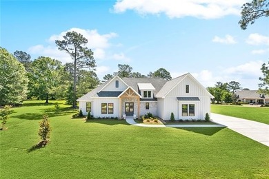 Beautifully appointed home on an expansive lot, offering on Money Hill Golf and Country Club in Louisiana - for sale on GolfHomes.com, golf home, golf lot