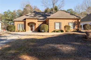 Welcome to this charming home in the desirable Lake Down North on Canongate At Georgia National Golf Club in Georgia - for sale on GolfHomes.com, golf home, golf lot