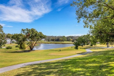 If you like open  airy spaces with abundant natural light and on Highland Lakes Executive Golf Course in Florida - for sale on GolfHomes.com, golf home, golf lot