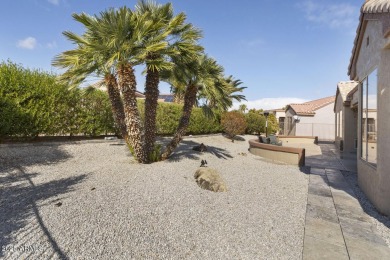 This beautifully updated Windrose model has fantastic curb on Granite Falls Golf Club  in Arizona - for sale on GolfHomes.com, golf home, golf lot