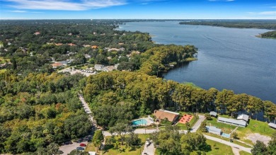 If you like open  airy spaces with abundant natural light and on Highland Lakes Executive Golf Course in Florida - for sale on GolfHomes.com, golf home, golf lot