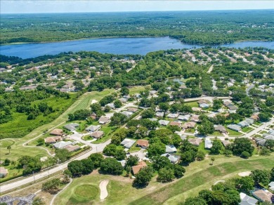 If you like open  airy spaces with abundant natural light and on Highland Lakes Executive Golf Course in Florida - for sale on GolfHomes.com, golf home, golf lot