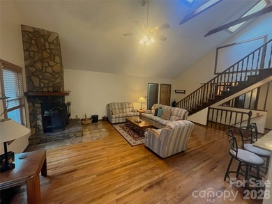 Resort home located at the tip of a quiet cul-de-sac street in on Rumbling Bald Resort on Lake Lure in North Carolina - for sale on GolfHomes.com, golf home, golf lot