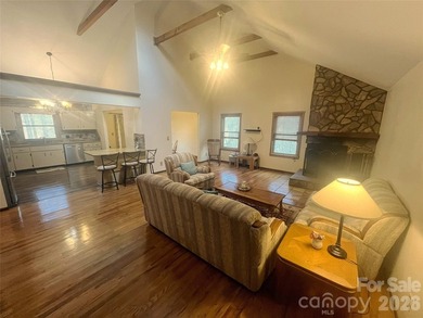 Resort home located at the tip of a quiet cul-de-sac street in on Rumbling Bald Resort on Lake Lure in North Carolina - for sale on GolfHomes.com, golf home, golf lot