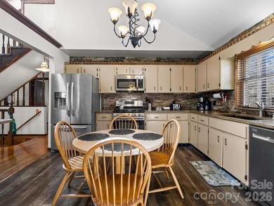 Resort home located at the tip of a quiet cul-de-sac street in on Rumbling Bald Resort on Lake Lure in North Carolina - for sale on GolfHomes.com, golf home, golf lot