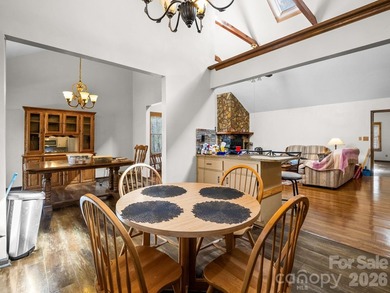 Resort home located at the tip of a quiet cul-de-sac street in on Rumbling Bald Resort on Lake Lure in North Carolina - for sale on GolfHomes.com, golf home, golf lot