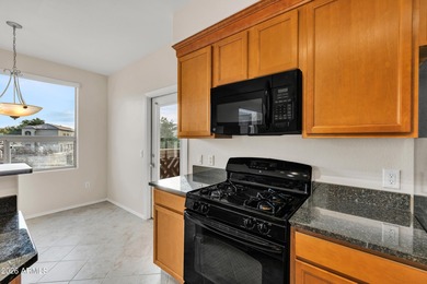 Move-in ready 2-bedroom, 2-bath condo ideally located north of on Tatum Ranch Golf Course in Arizona - for sale on GolfHomes.com, golf home, golf lot