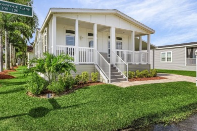 This 2024 Jacobsen Home offering two bedrooms, plus a den, is on Royal Wood Golf and Country Club in Florida - for sale on GolfHomes.com, golf home, golf lot