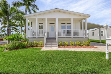 This 2024 Jacobsen Home offering two bedrooms, plus a den, is on Royal Wood Golf and Country Club in Florida - for sale on GolfHomes.com, golf home, golf lot