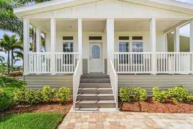 This 2024 Jacobsen Home offering two bedrooms, plus a den, is on Royal Wood Golf and Country Club in Florida - for sale on GolfHomes.com, golf home, golf lot