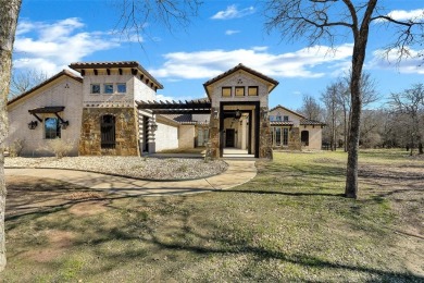 This exquisite modern Spanish-style custom home located in a on Sugar Tree Golf and Country Club in Texas - for sale on GolfHomes.com, golf home, golf lot