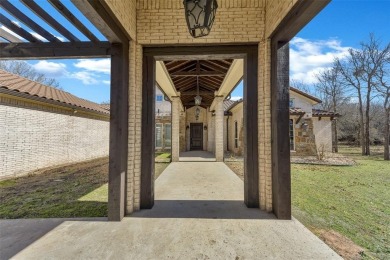 This exquisite modern Spanish-style custom home located in a on Sugar Tree Golf and Country Club in Texas - for sale on GolfHomes.com, golf home, golf lot