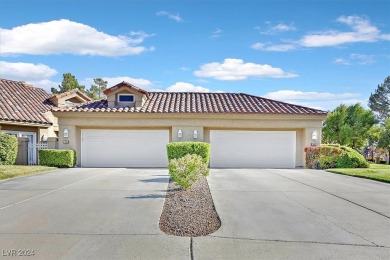 This stunning designer home, nestled on a scenic golf course on Spanish Trail Golf and Country Club in Nevada - for sale on GolfHomes.com, golf home, golf lot