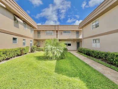 True waterfront unit with relaxing water views from your patio on Kings Point Golf - Executive in Florida - for sale on GolfHomes.com, golf home, golf lot