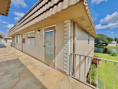 True waterfront unit with relaxing water views from your patio on Kings Point Golf - Executive in Florida - for sale on GolfHomes.com, golf home, golf lot
