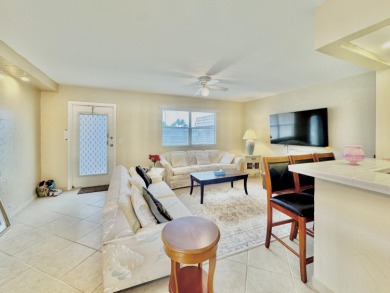 True waterfront unit with relaxing water views from your patio on Kings Point Golf - Executive in Florida - for sale on GolfHomes.com, golf home, golf lot